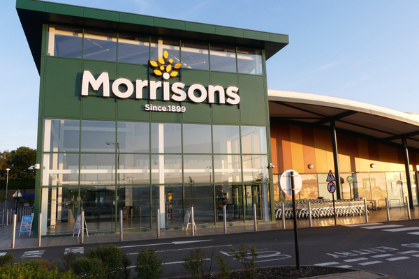 Thousands of store workers at UK supermarket chain Morrisons have won the first round of their legal battle for equal pay.
