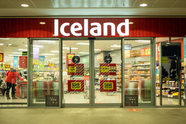 Iceland boss Richard Walker has said he has been forced to stop the opening of planned new stores after the latest energy bill for the frozen food retailer rose by £20m.