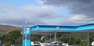 Co-op agrees to sell 130 petrol stations for £450m to cut debts